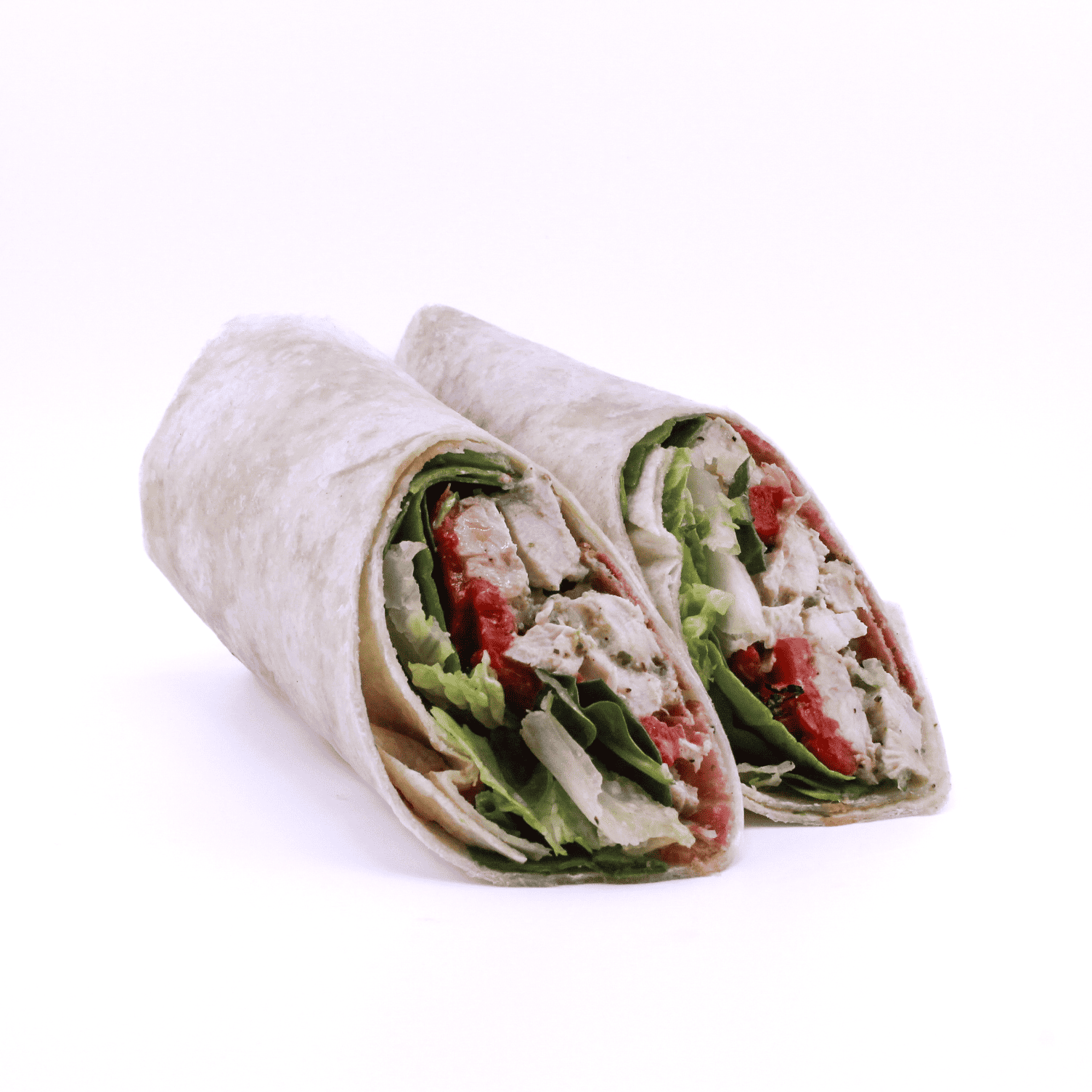 Chicken Goodness (Wrap) - Green goodness chicken salad, bacon, roasted red peppers, mixed greens, roasted tomatoes wrapped in a flour tortilla