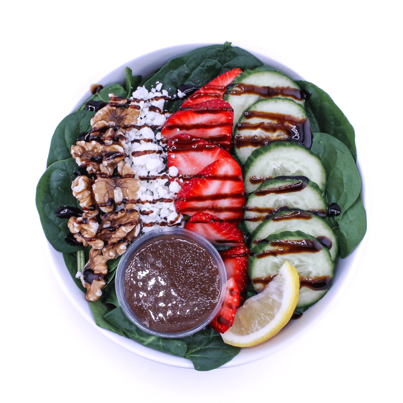 Strawberry Fields -  Spinach, cucumbers, goat cheese, walnuts, strawberry slices, balsamic reduction, balsamic vinaigrette - Vegetarian, Contains Nuts, Gluten Free 