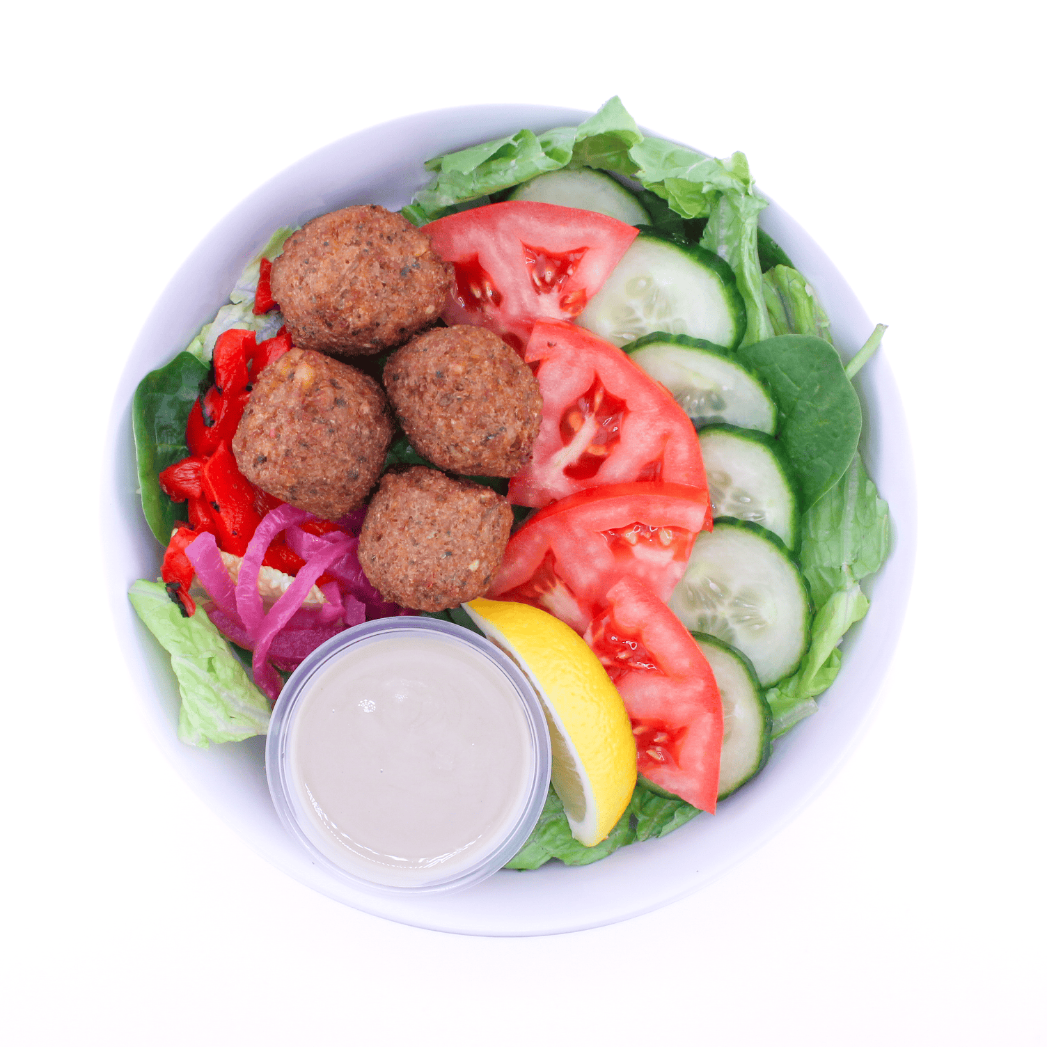 Falafel, tomatoes, roasted red peppers, cucumbers, pickled red onions, mixed greens, tahini dressing